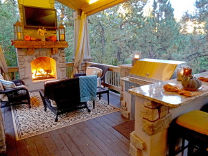 Mile High Landscaping traditional rustic covered deck custom fire place outdoor kitchen outdoor living dining